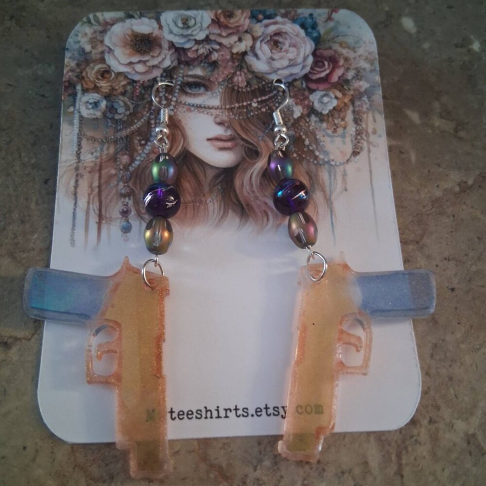 Dangle gun earrings